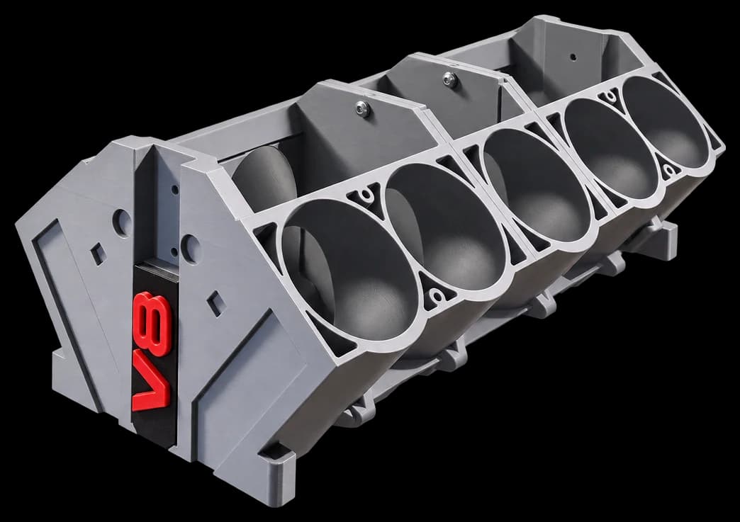 Grey 3D printed V8 engine block drinks cooler with a red V8 badge